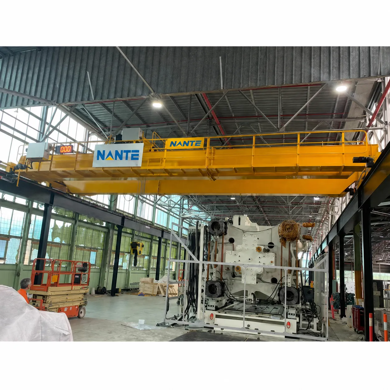 Double girder overhead crane for heavy machinery assembly