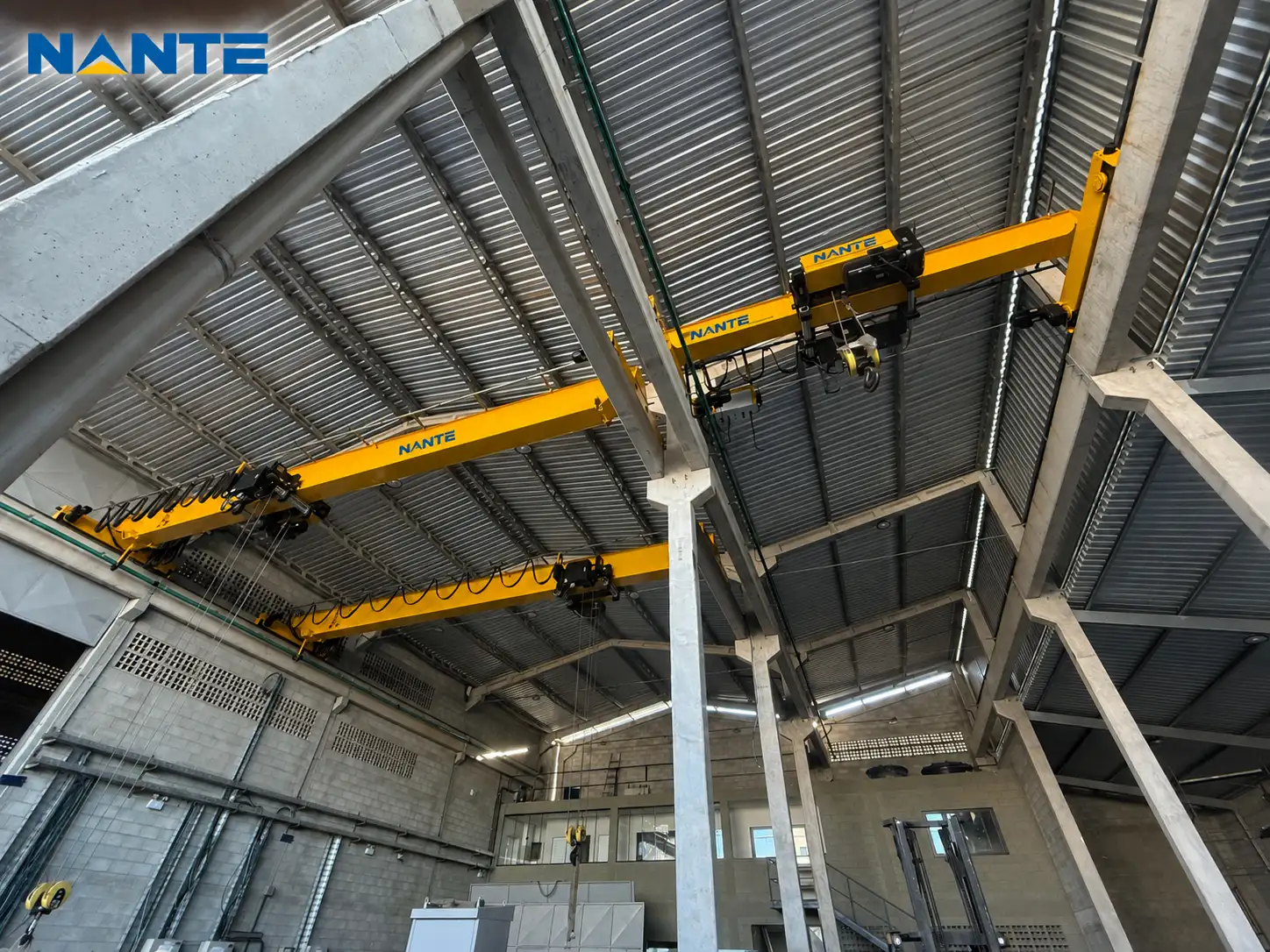 Industrial overhead cranes installed in a factory building