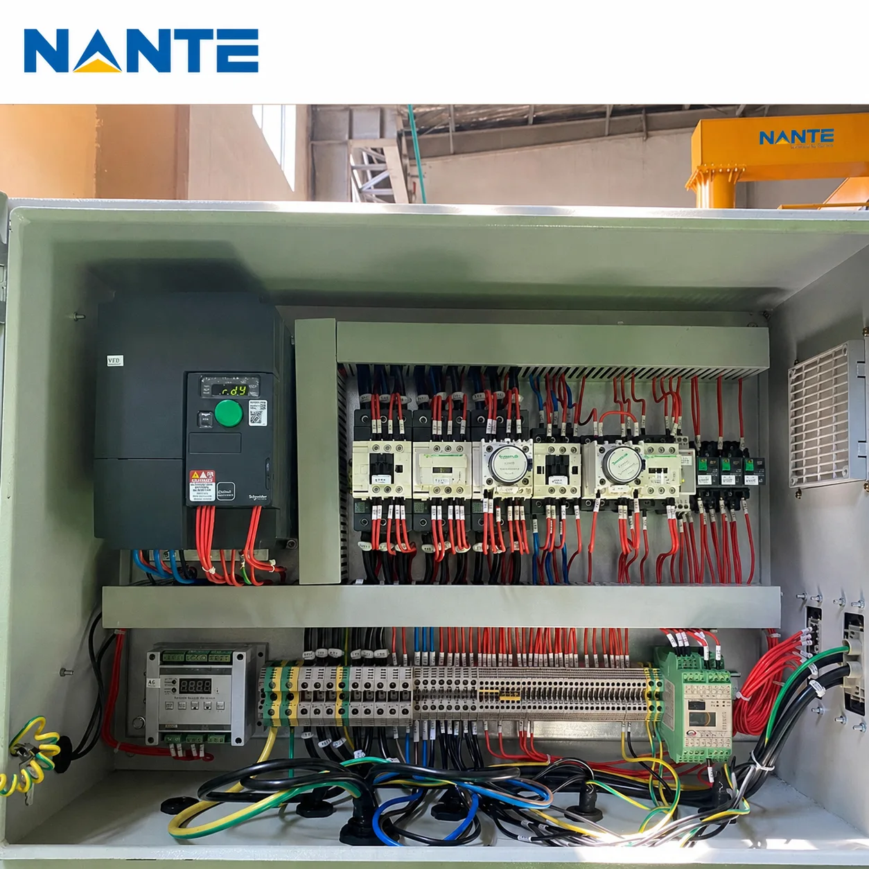 Open crane control panel with electrical components