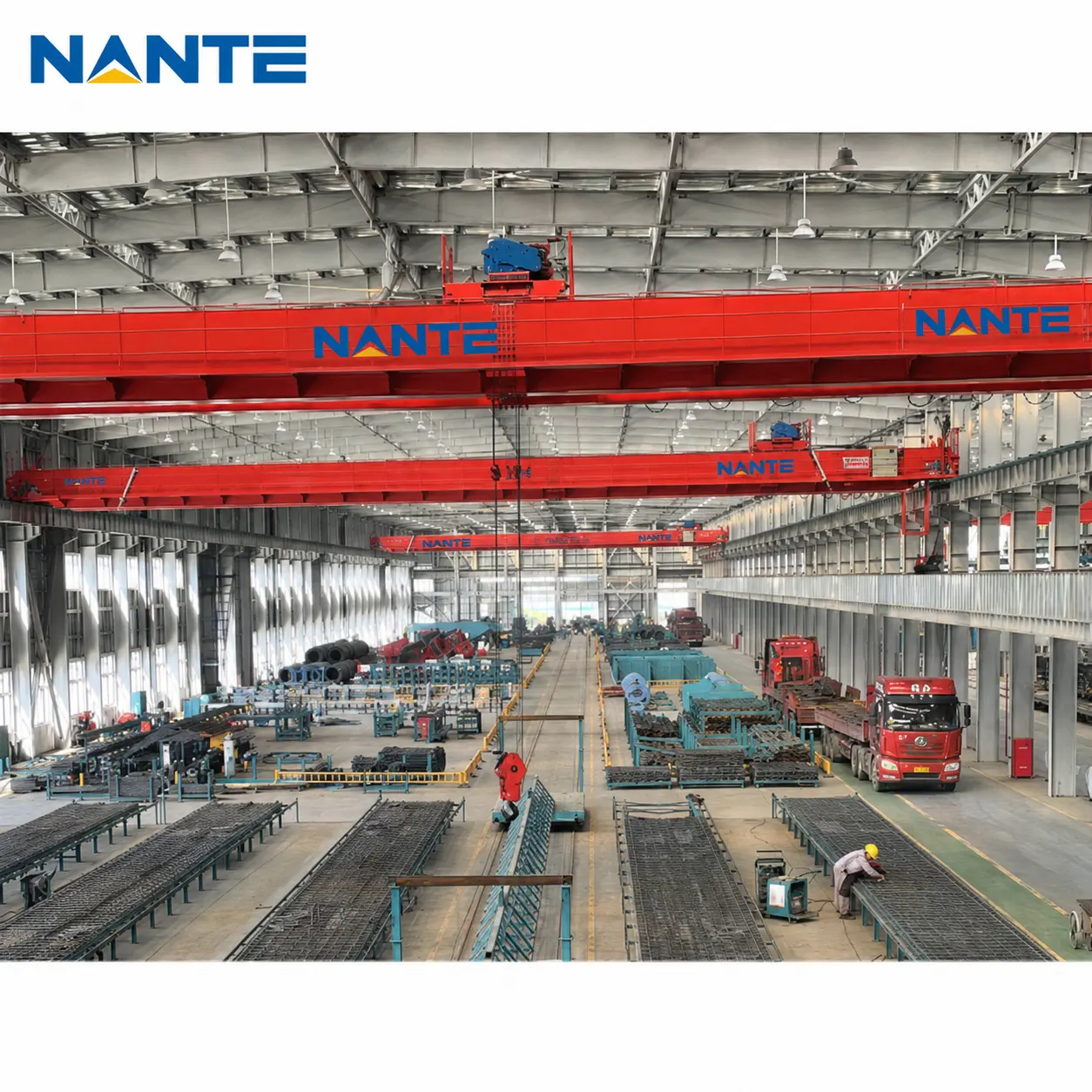Overhead crane system for heavy machinery manufacturing facility