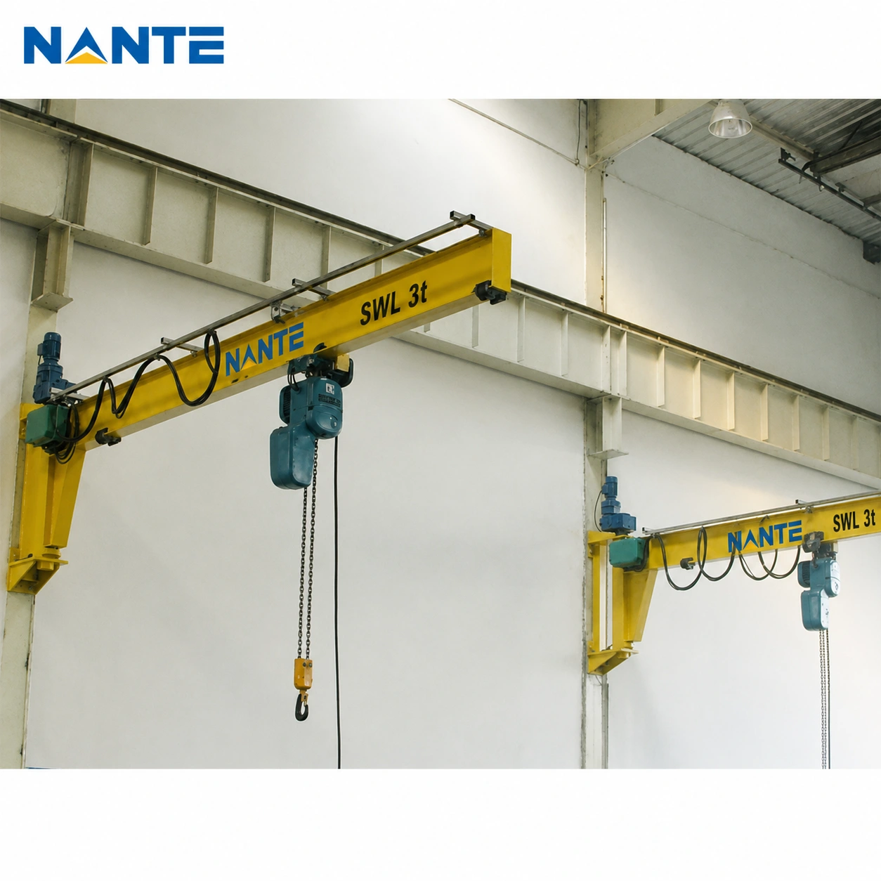 Wall mounted jib crane installed on an existing factory column