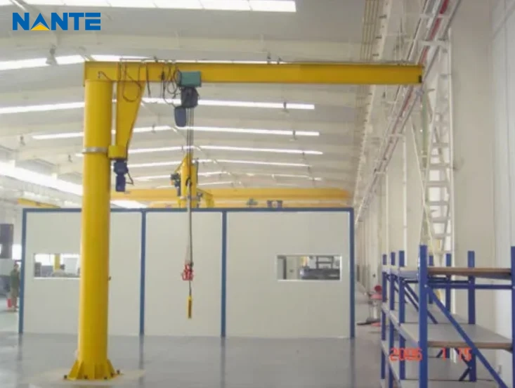 Floor mounted jib crane with an independent mast and base