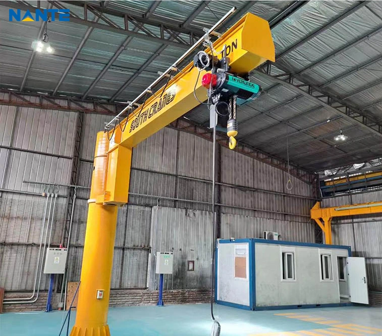 Free-standing industrial jib crane with electric hoist