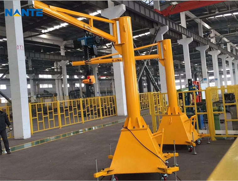 Movable jib crane with wheeled base for flexible material handling