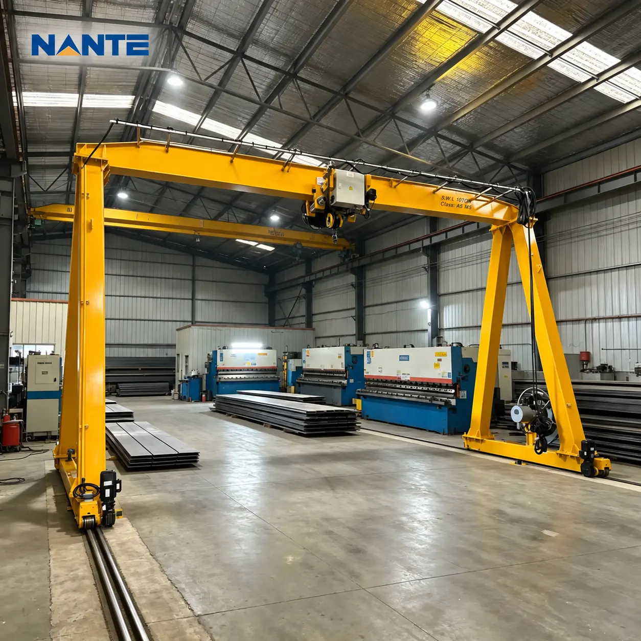 Single-girder gantry crane in a steel fabrication workshop